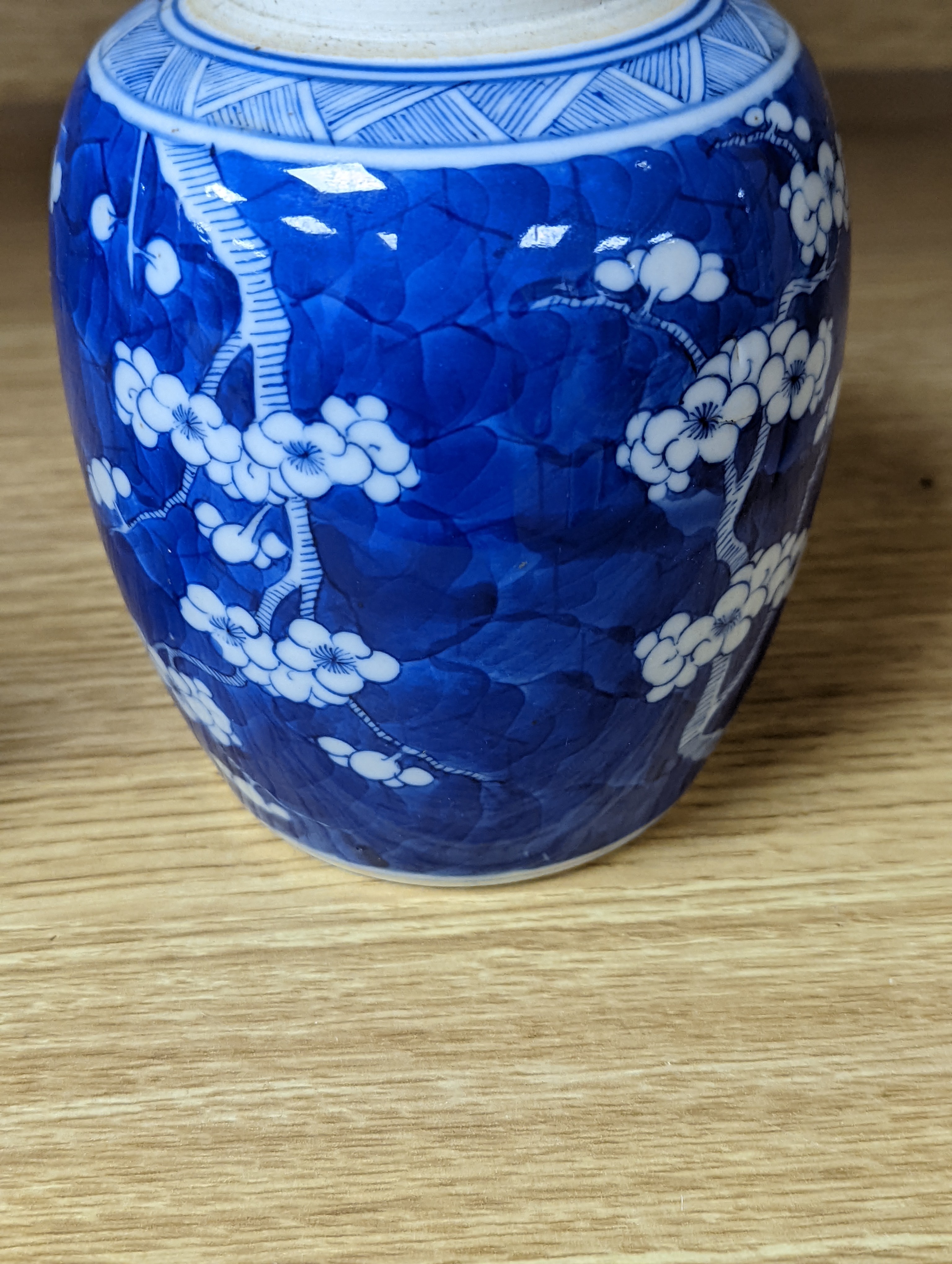 A 19th century Chinese blue and white prunus jar 13.5cm